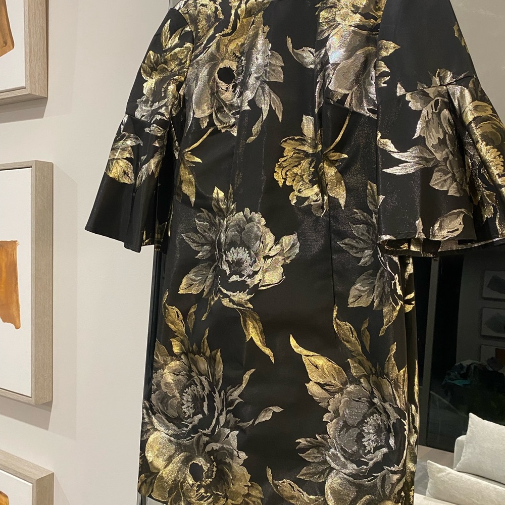 Trina Turk Elegant Black Garment with Gold Details